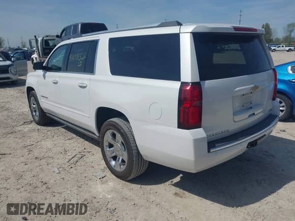 2018 Chevrolet Suburban Premier z VIN 1GNSKJKC9JR323192, wystawiony jako IAAI lot #42096522 z przebiegiem 148 240 mil mil oraz . Historia ofert i sprzedaży dostępna na DreamBid. Obrazek 3.