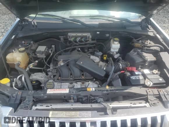 2008 Mercury Mariner Premier with VIN 4M2CU97138KJ12158, listed as a Copart auction lot 67723145 with 132,629 mi miles and Salvage title. Bid and sale history available at DreamBid. Image 12.