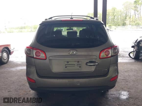 2011 Hyundai Santa Fe Limited z VIN 5XYZK3AB8BG039970, wystawiony jako IAAI lot #43027463 z przebiegiem 186 781 mil mil oraz . Historia ofert i sprzedaży dostępna na DreamBid. Obrazek 16.