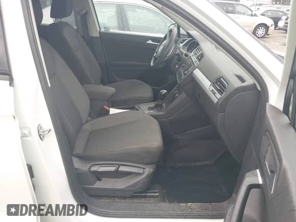 2019 Volkswagen Tiguan S with VIN 3VV1B7AXXKM087166, listed as a IAAI auction lot 42672005 with 68,269 mi miles and . Bid and sale history available at DreamBid. Image 5.