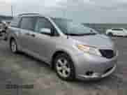 2012 Toyota Sienna with VIN 5TDZK3DC8CS252345, listed as a Copart auction lot 71726215 with 237,196 mi miles and Clean title. Bid and sale history available at DreamBid. Image 4.