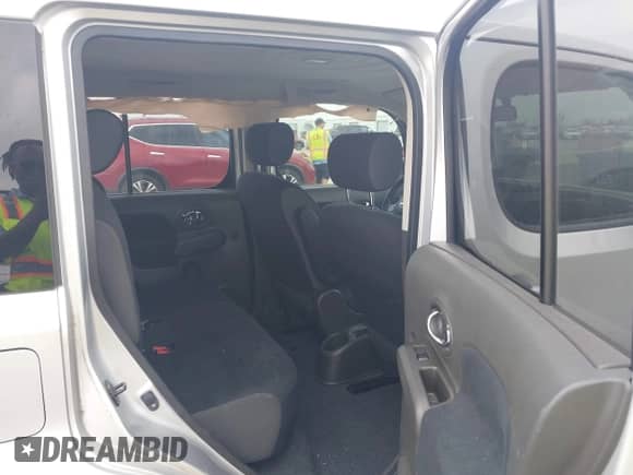 2013 Nissan Cube S with VIN JN8AZ2KR1DT304769, listed as a IAAI auction lot 41941411 with 64,518 mi miles and . Bid and sale history available at DreamBid. Image 8.