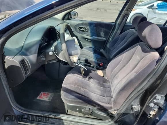 1997 Saturn SL with VIN 1G8ZK5271VZ288861, listed as a Copart auction lot 80120265 with 260,488 mi miles and Salvage title. Bid and sale history available at DreamBid. Image 7.