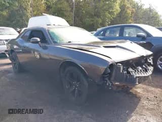 2019 Dodge Challenger SXT z VIN 2C3CDZAG0KH712674, wystawiony jako IAAI lot #43223586 z przebiegiem 96 843 mil mil oraz . Historia ofert i sprzedaży dostępna na DreamBid. Obrazek 1.