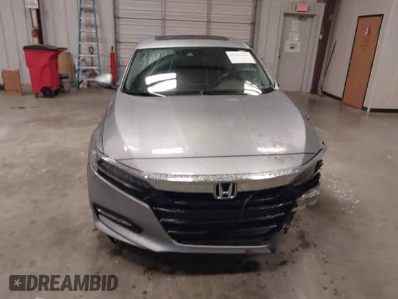 2018 Honda Accord Touring z VIN 1HGCV3F94JA001591, wystawiony jako IAAI lot #42161624 z przebiegiem 100 591 mil mil oraz . Historia ofert i sprzedaży dostępna na DreamBid. Obrazek 13.