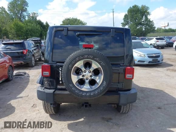 2016 Jeep Wrangler Sahara z VIN 1C4AJWBG2GL108479, wystawiony jako IAAI lot #43295339 z przebiegiem 57 237 mil mil oraz . Historia ofert i sprzedaży dostępna na DreamBid. Obrazek 17.