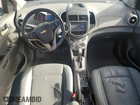 2015 Chevrolet Sonic LTZ with VIN 1G1JE5SB5F4130609, listed as a Copart auction lot 61953685 with 78,747 mi miles and Salvage title. Bid and sale history available at DreamBid. Image 8.