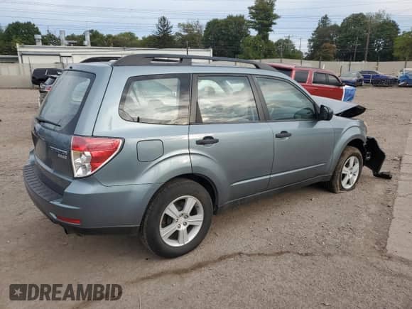 2010 Subaru Forester X with VIN JF2SH6BC5AH801135, listed as a Copart auction lot 80888325 with 157,758 mi miles and Salvage title. Bid and sale history available at DreamBid. Image 3.