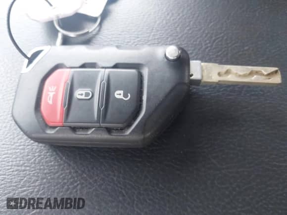 2023 Jeep Wrangler Sahara with VIN 1C4JJXP69PW695915, listed as a IAAI auction lot 42662028 with 36,957 mi miles and . Bid and sale history available at DreamBid. Image 11.