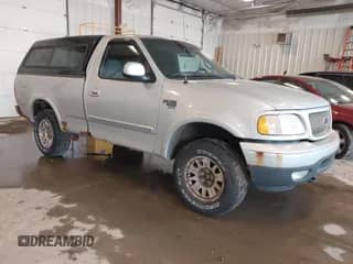 2001 Ford F-150 XL z VIN 2FTRF18W31CB06246, wystawiony jako IAAI lot #42307983 z przebiegiem 148 440 mil mil oraz . Historia ofert i sprzedaży dostępna na DreamBid. Obrazek 1.