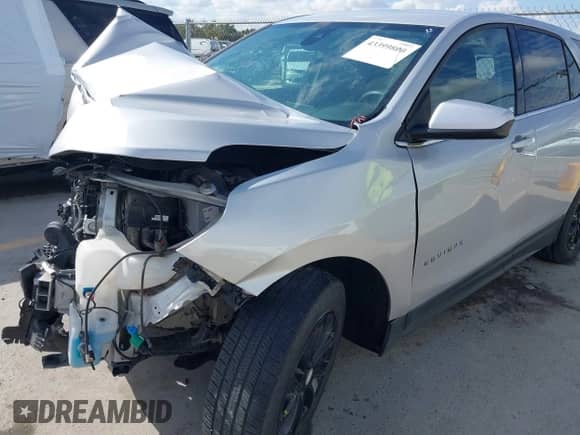 2020 Chevrolet Equinox LT with VIN 2GNAXTEV4L6134230, listed as a IAAI auction lot 43399800 with 122,008 mi miles and . Bid and sale history available at DreamBid. Image 17.