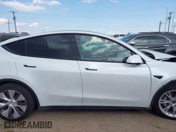 2021 Tesla Model Y Long Range with VIN 5YJYGDEE0MF095080, listed as a IAAI auction lot 42931169 with Not provided miles and . Bid and sale history available at DreamBid. Image 12.