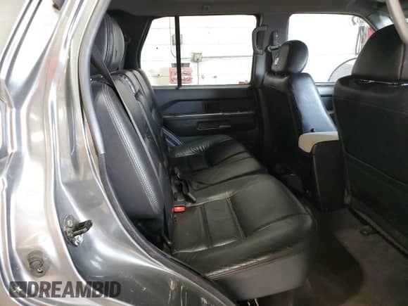 2004 Nissan Pathfinder SE z VIN JN8DR09Y64W907066, wystawiony jako Copart lot #66511235 z przebiegiem 230 007 mil mil oraz Szkoda całkowita • Salvage title. Historia ofert i sprzedaży dostępna na DreamBid. Obrazek 11.