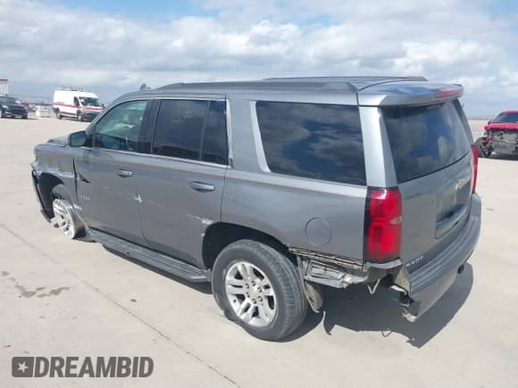 2019 Chevrolet Tahoe LS with VIN 1GNSKAKC7KR347704, listed as a IAAI auction lot 41532849 with 219,466 mi miles and . Bid and sale history available at DreamBid. Image 3.