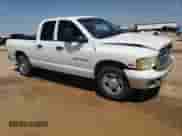 2003 Dodge 2500 ST with VIN 3D7KA28D93G732917, listed as a Copart auction lot 67169904 with 214,466 mi miles and Salvage title. Bid and sale history available at DreamBid. Image 4.