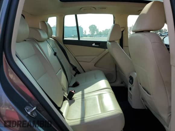 2013 Volkswagen Tiguan SE с VIN WVGAV7AX2DW023093, выставлен на аукционе Copart как лот 64694405 с пробегом 137 460 миль миль и Списание • Salvage title. История ставок и продаж доступна на DreamBid. Изображение 11.