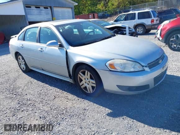 2011 Chevrolet Impala LT Fleet with VIN 2G1WG5EK9B1318812, listed as a IAAI auction lot 43521942 with 216,507 mi miles and . Bid and sale history available at DreamBid. Image 1.