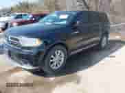 2020 Dodge Durango SXT with VIN 1C4RDHAGXLC345397, listed as a IAAI auction lot 41513617 with 68,198 mi miles and . Bid and sale history available at DreamBid. Image 2.