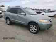 2009 Hyundai Santa Fe Limited с VIN 5NMSH13E09H313318, выставлен на аукционе Copart как лот 81930545 с пробегом 214 029 миль миль и Списание • Salvage title. История ставок и продаж доступна на DreamBid. Изображение 4.