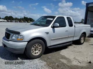 2002 Ford F-150 XL with VIN 1FTRX17W82NB59499, listed as a Copart auction lot 85295365 with 191,328 mi miles and Salvage title. Bid and sale history available at DreamBid. Image 1.
