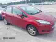 2014 Ford Fiesta SE z VIN 3FADP4BJXEM132171, wystawiony jako IAAI lot #42910603 z przebiegiem 159 580 mil mil oraz . Historia ofert i sprzedaży dostępna na DreamBid. Obrazek 1.