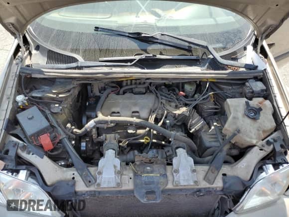 2003 Chevrolet Venture 1SA z VIN 1GNDX03E03D250976, wystawiony jako Copart lot #62318025 z przebiegiem 289 338 mil mil oraz Szkoda całkowita • Salvage title. Historia ofert i sprzedaży dostępna na DreamBid. Obrazek 12.