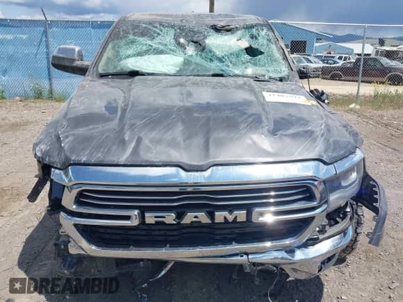 2021 Ram 1500 Laramie z VIN 1C6SRFJT1MN805824, wystawiony jako IAAI lot #42407592 z przebiegiem Nie podano mil oraz . Historia ofert i sprzedaży dostępna na DreamBid. Obrazek 12.