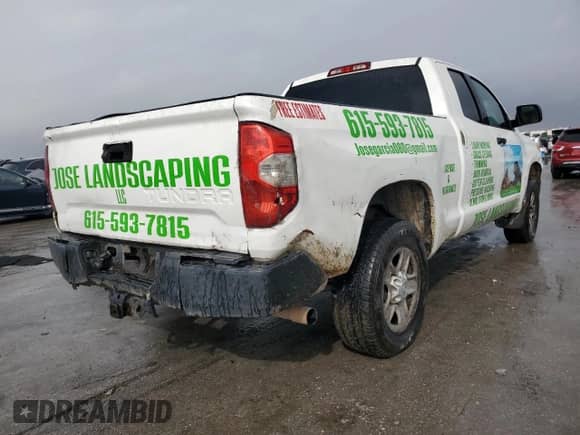 2014 Toyota Tundra SR with VIN 5TFRM5F16EX068715, listed as a Copart auction lot 90614305 with 312,428 mi miles and Clean title. Bid and sale history available at DreamBid. Image 3.