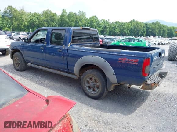 2002 Nissan Frontier XE with VIN 1N6ED29Y22C362795, listed as a IAAI auction lot 42432950 with 180,270 mi miles and . Bid and sale history available at DreamBid. Image 3.