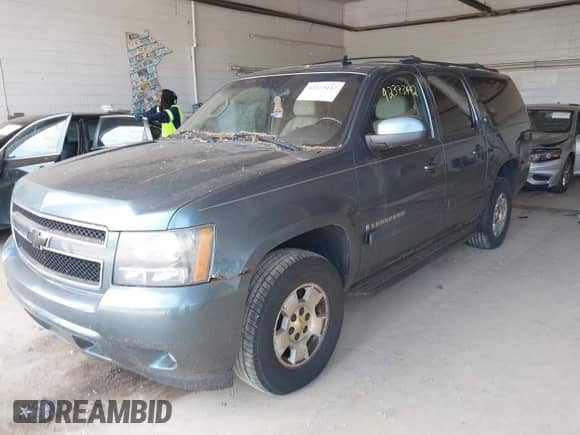 2008 Chevrolet Suburban LTZ z VIN 3GNFK163X8G201124, wystawiony jako IAAI lot #42373442 z przebiegiem 218 847 mil mil oraz . Historia ofert i sprzedaży dostępna na DreamBid. Obrazek 2.