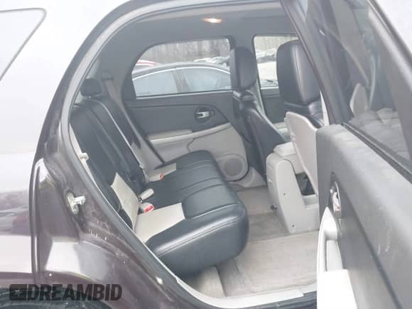 2006 Chevrolet Equinox LT z VIN 2CNDL73F566142938, wystawiony jako IAAI lot #41468387 z przebiegiem 173 525 mil mil oraz . Historia ofert i sprzedaży dostępna na DreamBid. Obrazek 8.