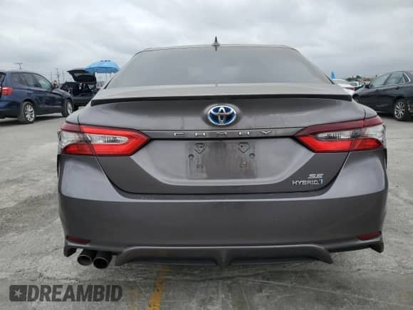 2023 Toyota Camry Hybrid SE with VIN 4T1S31AKXPU055821, listed as a Copart auction lot 84012145 with 148,408 mi miles and Salvage title. Bid and sale history available at DreamBid. Image 6.