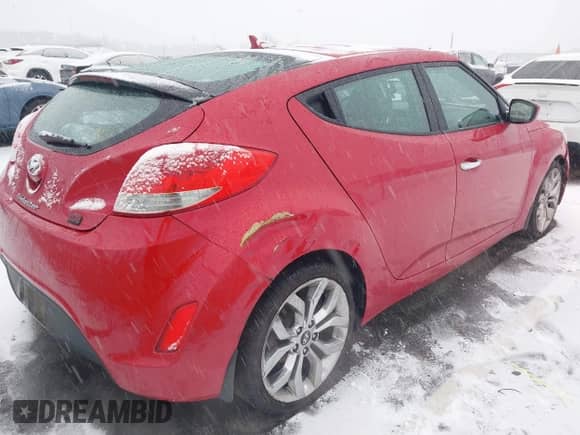 2014 Hyundai Veloster z VIN KMHTC6AD8EU214612, wystawiony jako IAAI lot #41258820 z przebiegiem 61 984 mil mil oraz . Historia ofert i sprzedaży dostępna na DreamBid. Obrazek 4.