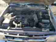 1997 Toyota Tacoma z VIN 4TAVL52NXVZ305250, wystawiony jako Copart lot #81581705 z przebiegiem 208 969 mil mil oraz Szkoda całkowita • Salvage title. Historia ofert i sprzedaży dostępna na DreamBid. Obrazek 11.