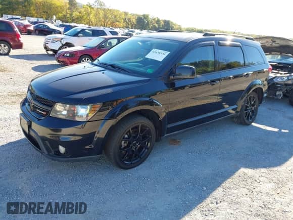 2015 Dodge Journey SXT with VIN 3C4PDCBG7FT583547, listed as a IAAI auction lot 43438520 with 144,178 mi miles and . Bid and sale history available at DreamBid. Image 2.