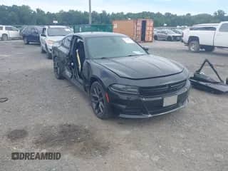 2019 Dodge Charger SXT with VIN 2C3CDXBG0KH706439, listed as a IAAI auction lot 43091789 with 103,062 mi miles and . Bid and sale history available at DreamBid. Image 1.