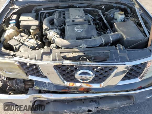 2007 Nissan Frontier SE with VIN 1N6AD06U77C458580, listed as a Copart auction lot 67972415 with 142,295 mi miles and Salvage title. Bid and sale history available at DreamBid. Image 11.