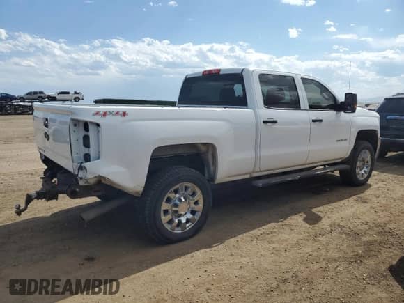 2015 Chevrolet Silverado 2500HD Work Truck z VIN 1GC1KUEG2FF605607, wystawiony jako Copart lot #60569655 z przebiegiem 155 741 mil mil oraz Szkoda całkowita • Salvage title. Historia ofert i sprzedaży dostępna na DreamBid. Obrazek 3.