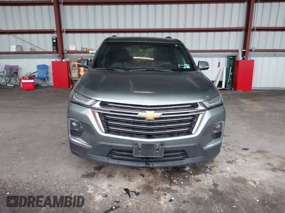 2022 Chevrolet Traverse LT Cloth z VIN 1GNEVGKW5NJ133220, wystawiony jako IAAI lot #42224191 z przebiegiem 97 309 mil mil oraz . Historia ofert i sprzedaży dostępna na DreamBid. Obrazek 12.