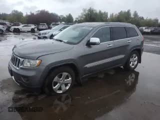 2012 Jeep Grand Cherokee Limited z VIN 1C4RJFBG2CC187150, wystawiony jako Copart lot #84956805 z przebiegiem 136 040 mil mil oraz Szkoda całkowita • Salvage title. Historia ofert i sprzedaży dostępna na DreamBid. Obrazek 1.