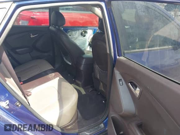 2013 Hyundai Tucson GLS z VIN KM8JU3AC4DU684497, wystawiony jako IAAI lot #42767585 z przebiegiem 83 250 mil mil oraz . Historia ofert i sprzedaży dostępna na DreamBid. Obrazek 8.