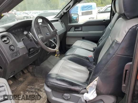 2014 Ford F-150 STX z VIN 1FTFX1EF5EFC90202, wystawiony jako Copart lot #84009215 z przebiegiem 143 742 mil mil oraz Szkoda całkowita • Salvage title. Historia ofert i sprzedaży dostępna na DreamBid. Obrazek 7.