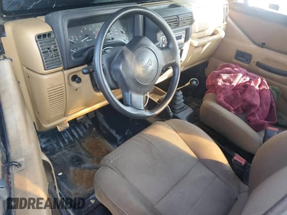 1997 Jeep Wrangler SE z VIN 1J4FY29PXVP437267, wystawiony jako Copart lot #69390955 z przebiegiem 151 349 mil mil oraz Czysty tytuł • Clean title. Historia ofert i sprzedaży dostępna na DreamBid. Obrazek 8.