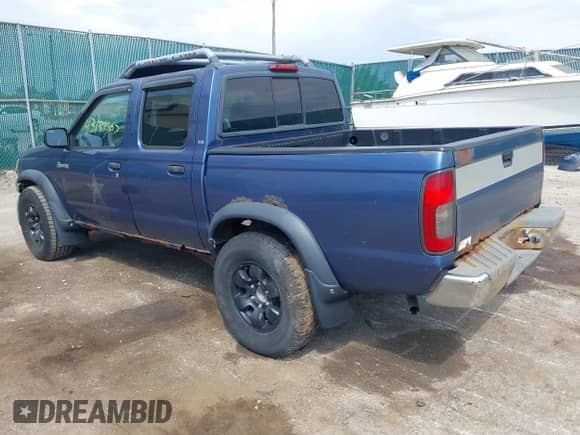 2000 Nissan Frontier XE with VIN 1N6ED27T5YC403713, listed as a IAAI auction lot 43139507 with 184,813 mi miles and . Bid and sale history available at DreamBid. Image 3.