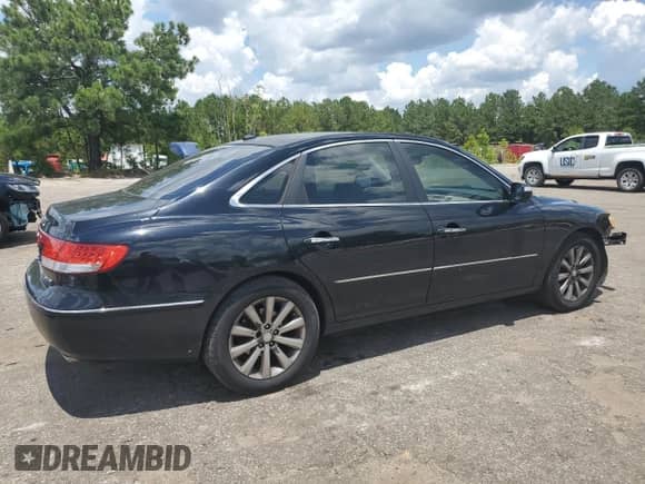 2009 Hyundai Azera Limited с VIN KMHFC46FX9A381167, выставлен на аукционе Copart как лот 61723195 с пробегом 182 359 миль миль и Списание • Salvage title. История ставок и продаж доступна на DreamBid. Изображение 3.