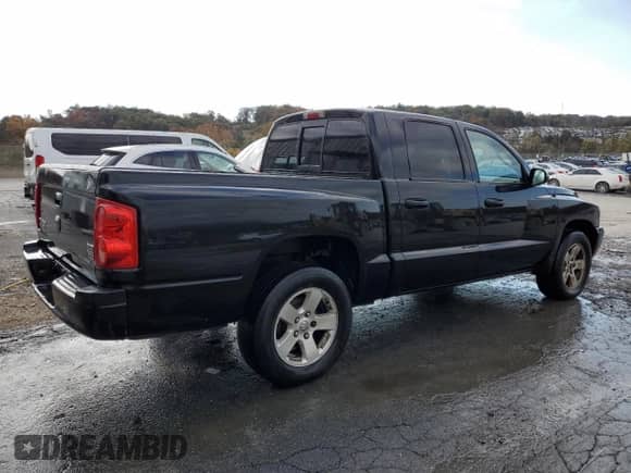 2007 Dodge Dakota SLT с VIN 1D7HW48PX7S199993, выставлен на аукционе Copart как лот 84012285 с пробегом 167 892 миль миль и Чистый • Clean title. История ставок и продаж доступна на DreamBid. Изображение 3.