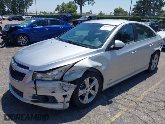2013 Chevrolet Cruze 2LT with VIN 1G1PE5SB8D7124308, listed as a IAAI auction lot 42609447 with 127,307 mi miles and . Bid and sale history available at DreamBid. Image 2.
