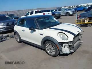 2015 MINI Hardtop with VIN WMWXM5C52FT939095, listed as a IAAI auction lot 43253766 with 144,553 mi miles and . Bid and sale history available at DreamBid. Image 1.