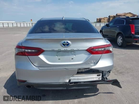 2021 Toyota Camry Hybrid XLE with VIN 4T1F31AK5MU565376, listed as a IAAI auction lot 42687616 with 57,880 mi miles and . Bid and sale history available at DreamBid. Image 16.