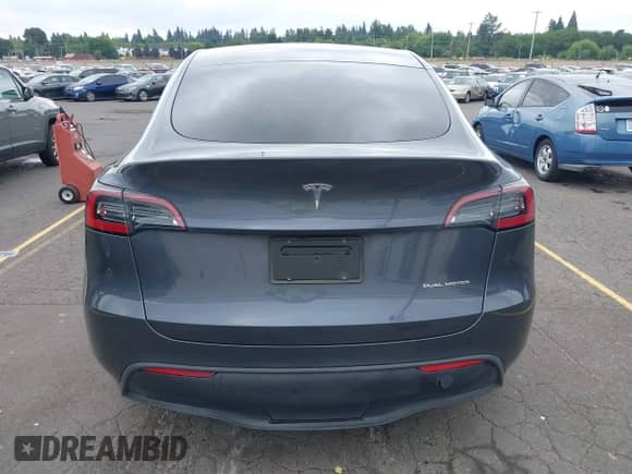 2023 Tesla Model Y Long Range with VIN 7SAYGDEE4PF806349, listed as a IAAI auction lot 42217660 with 39,898 mi miles and . Bid and sale history available at DreamBid. Image 17.